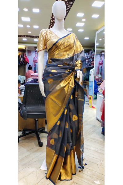 Premium Quality Slate Organza Silk Saree With Reshmi Zari Weaving Wide Border And Butta Weaving Work On All Over Base (KR2260)